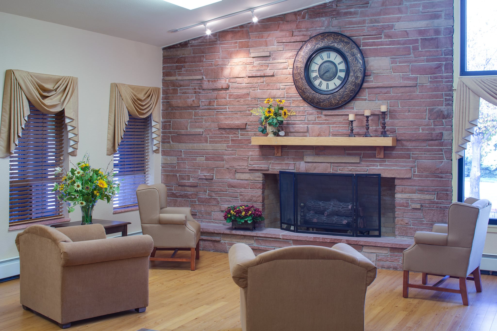 Sitting room with fireplace at Pikes Peak Post Acute